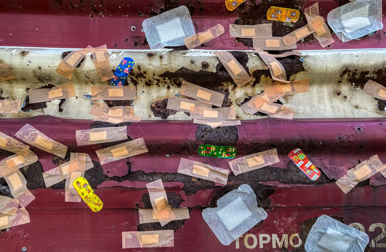 All Will Pass, installation, wagon covered in adhesive plasters, view 2