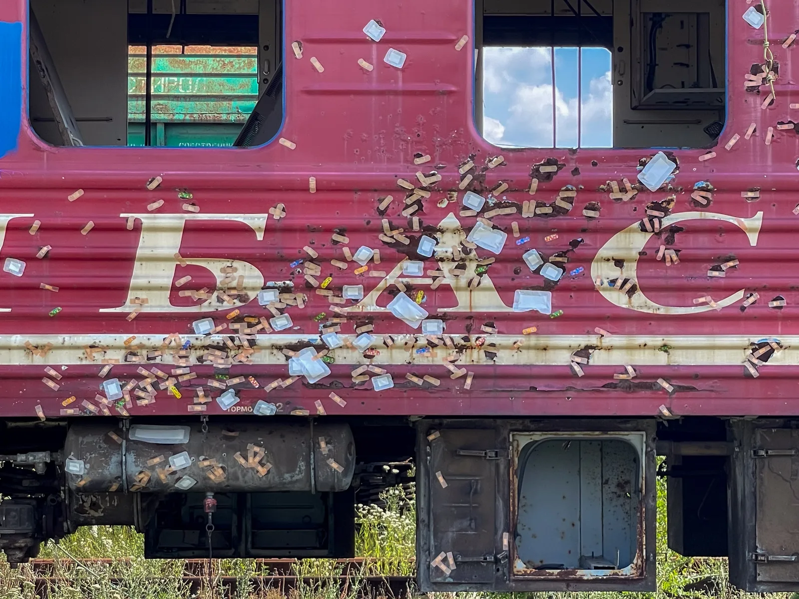 All Will Pass, installation, wagon covered in adhesive plasters, view 3